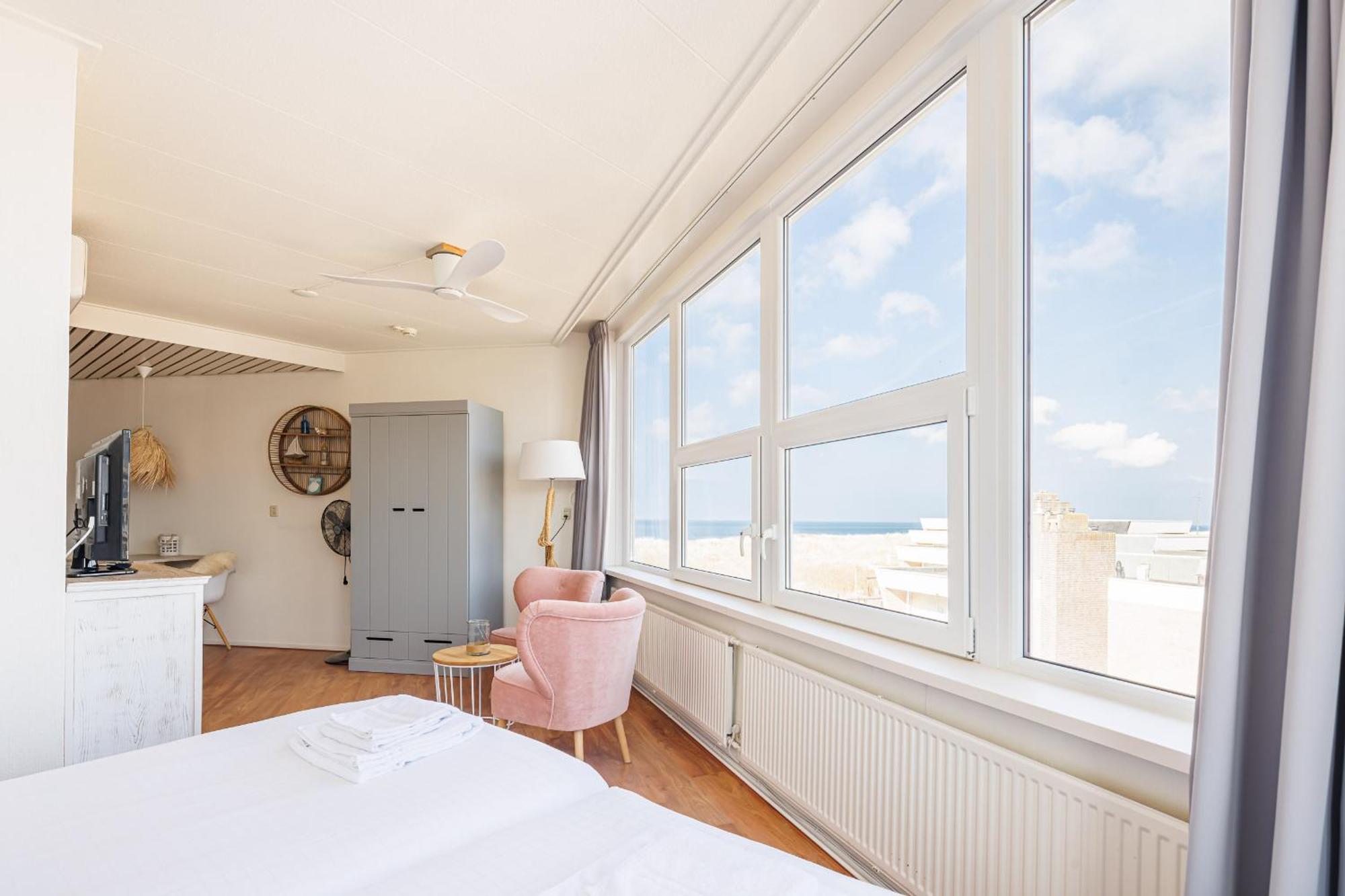 Neptunus Appartementen แบร์เกิน อาน ซี ห้อง รูปภาพ