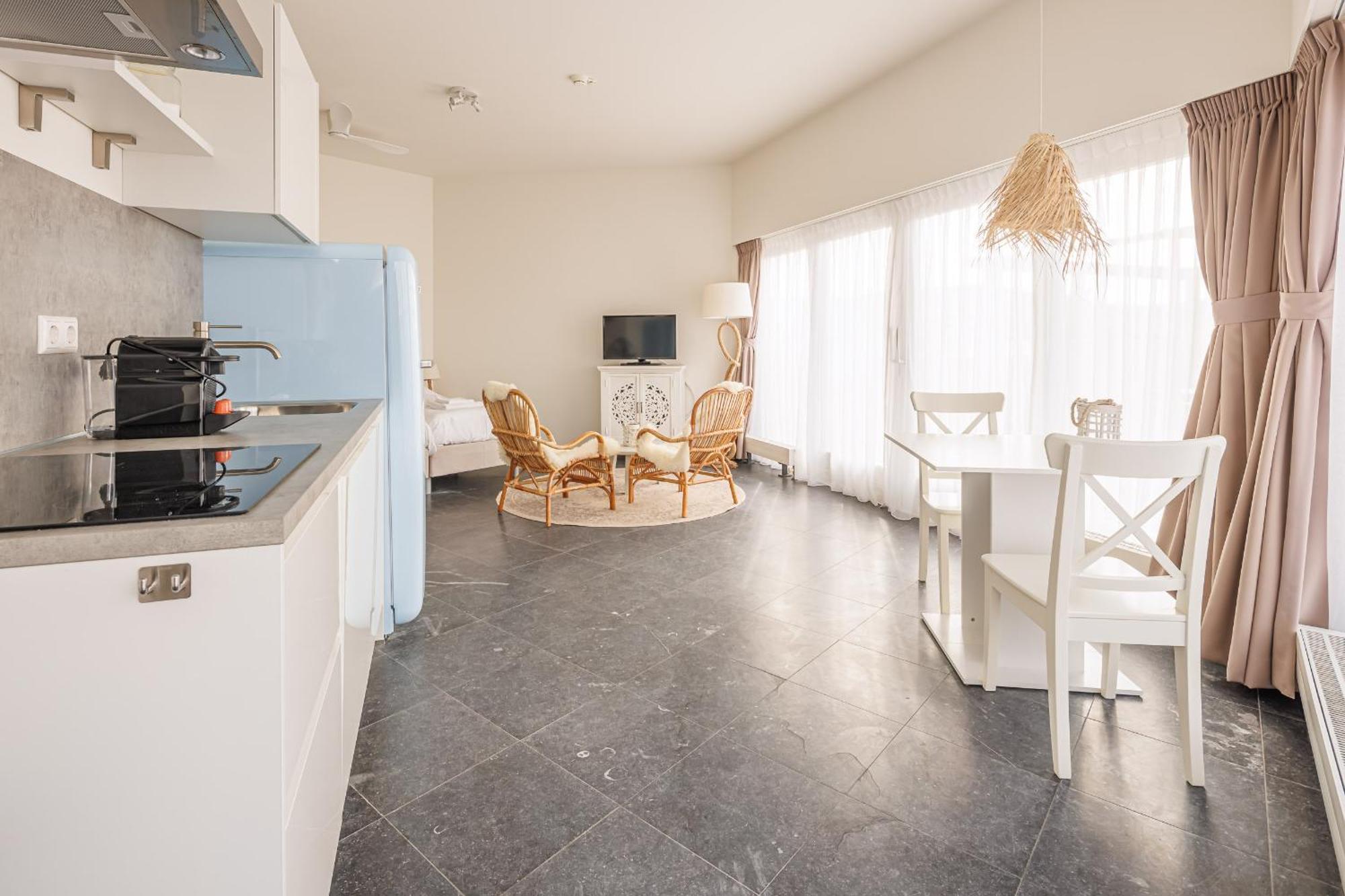 Neptunus Appartementen แบร์เกิน อาน ซี ห้อง รูปภาพ