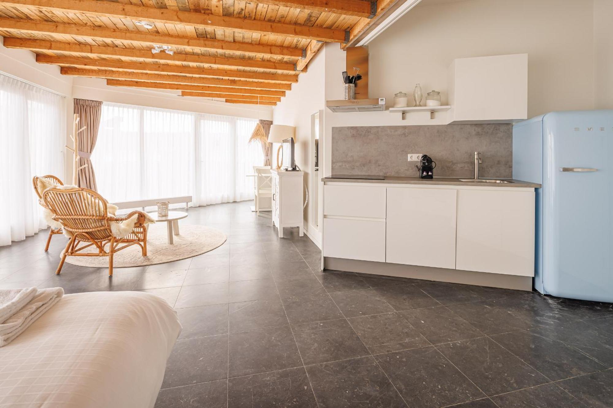 Neptunus Appartementen แบร์เกิน อาน ซี ห้อง รูปภาพ