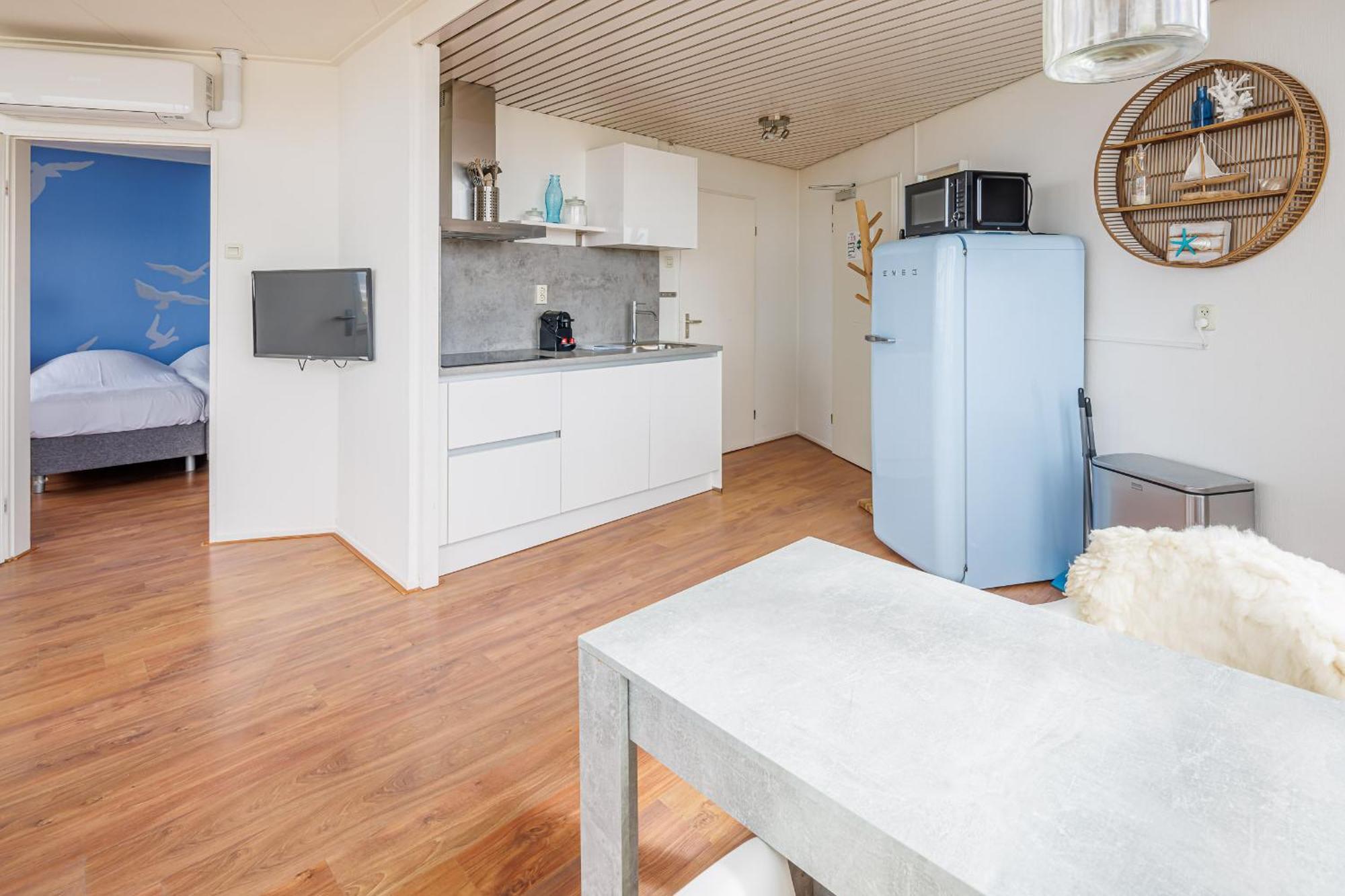 Neptunus Appartementen แบร์เกิน อาน ซี ห้อง รูปภาพ