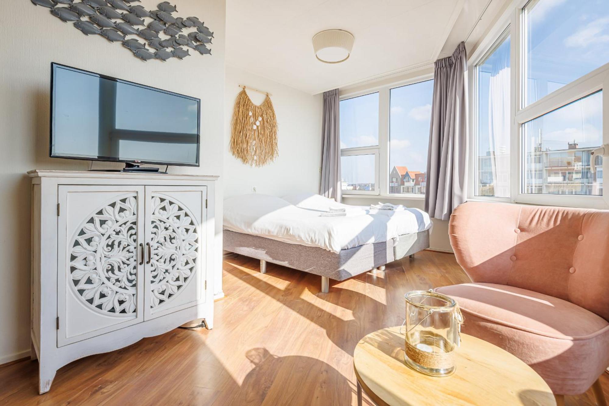 Neptunus Appartementen แบร์เกิน อาน ซี ห้อง รูปภาพ