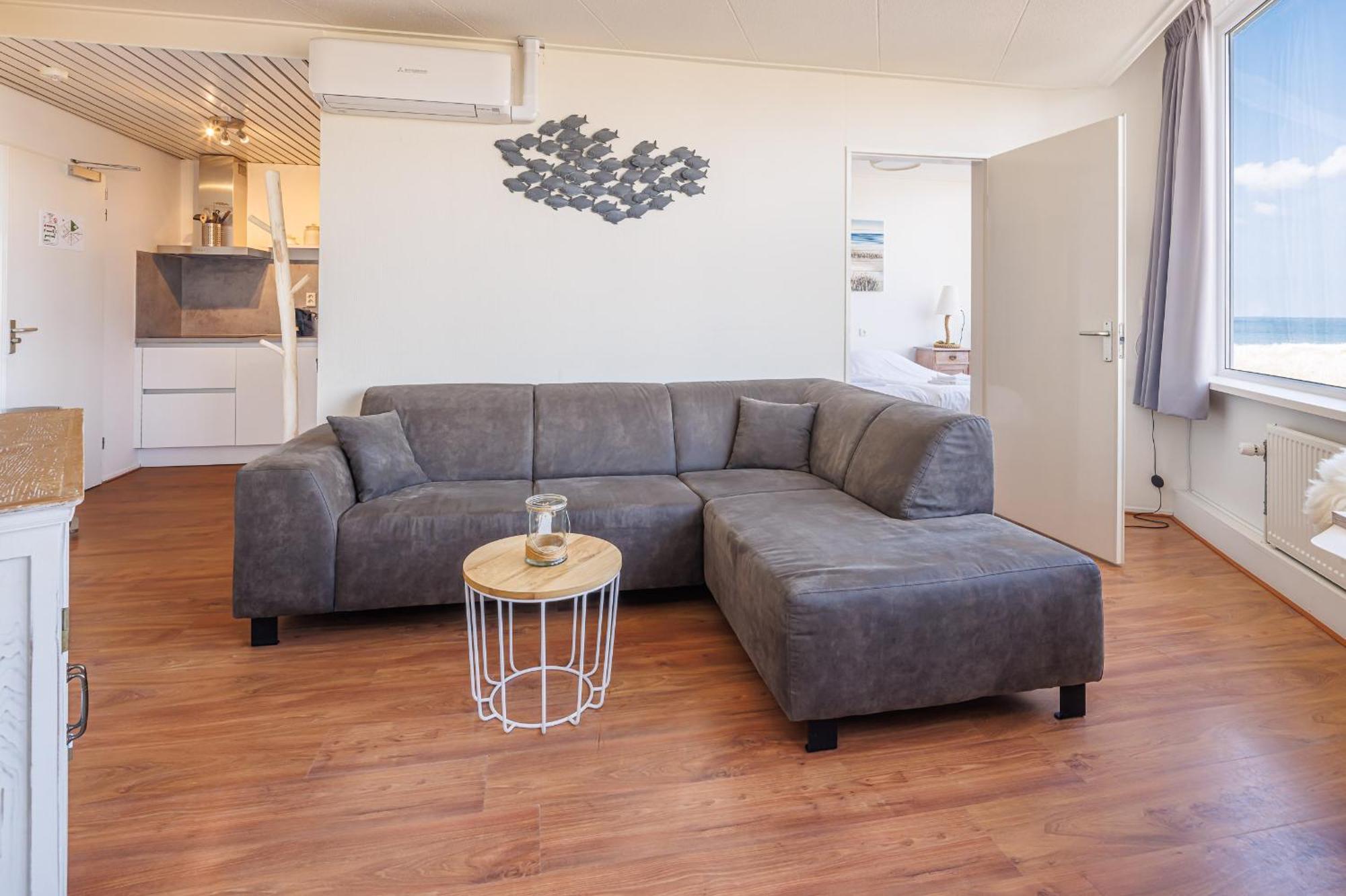 Neptunus Appartementen แบร์เกิน อาน ซี ห้อง รูปภาพ