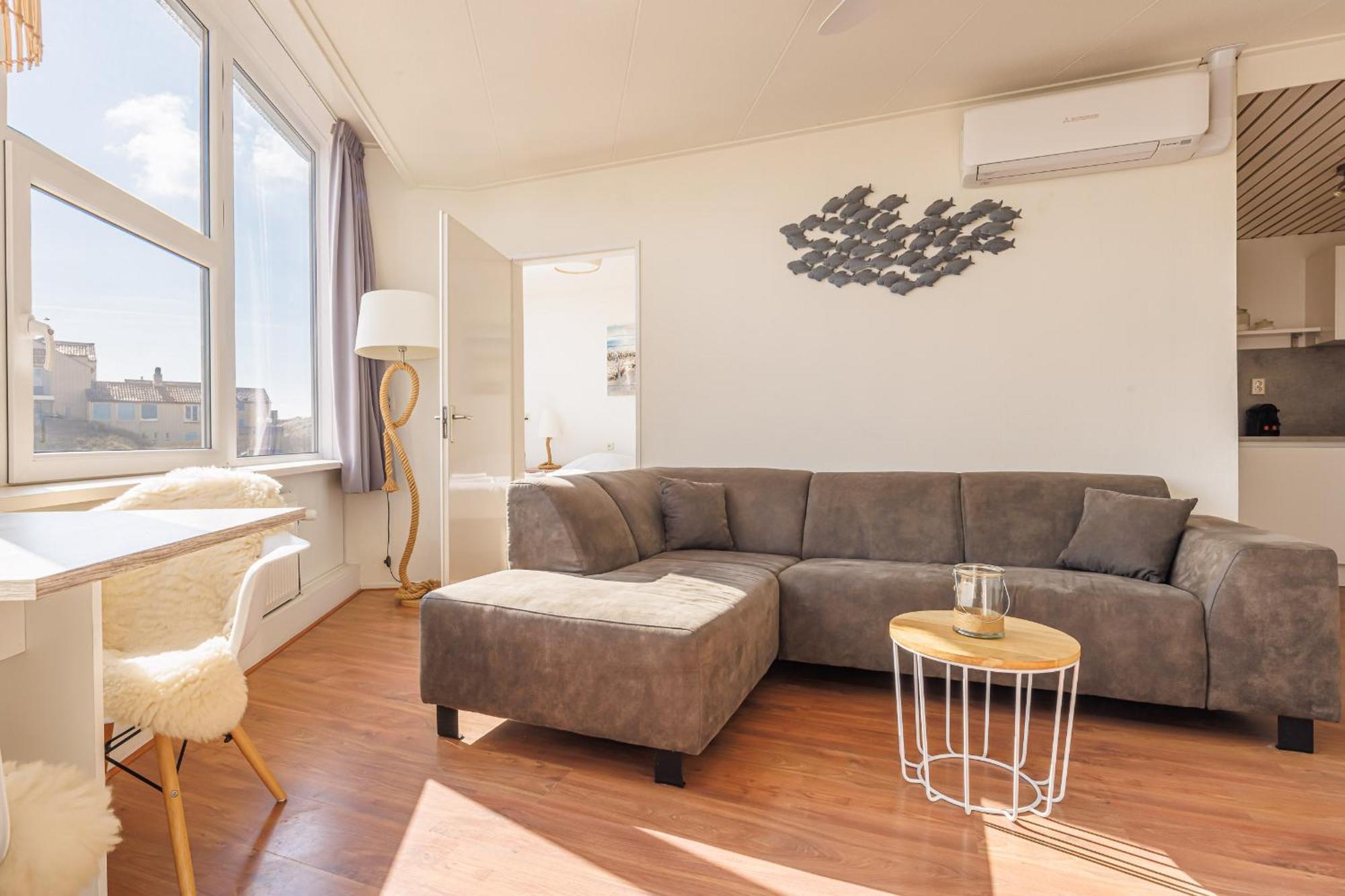 Neptunus Appartementen แบร์เกิน อาน ซี ห้อง รูปภาพ
