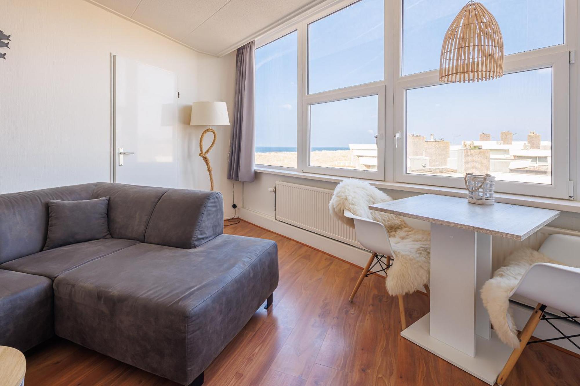 Neptunus Appartementen แบร์เกิน อาน ซี ห้อง รูปภาพ