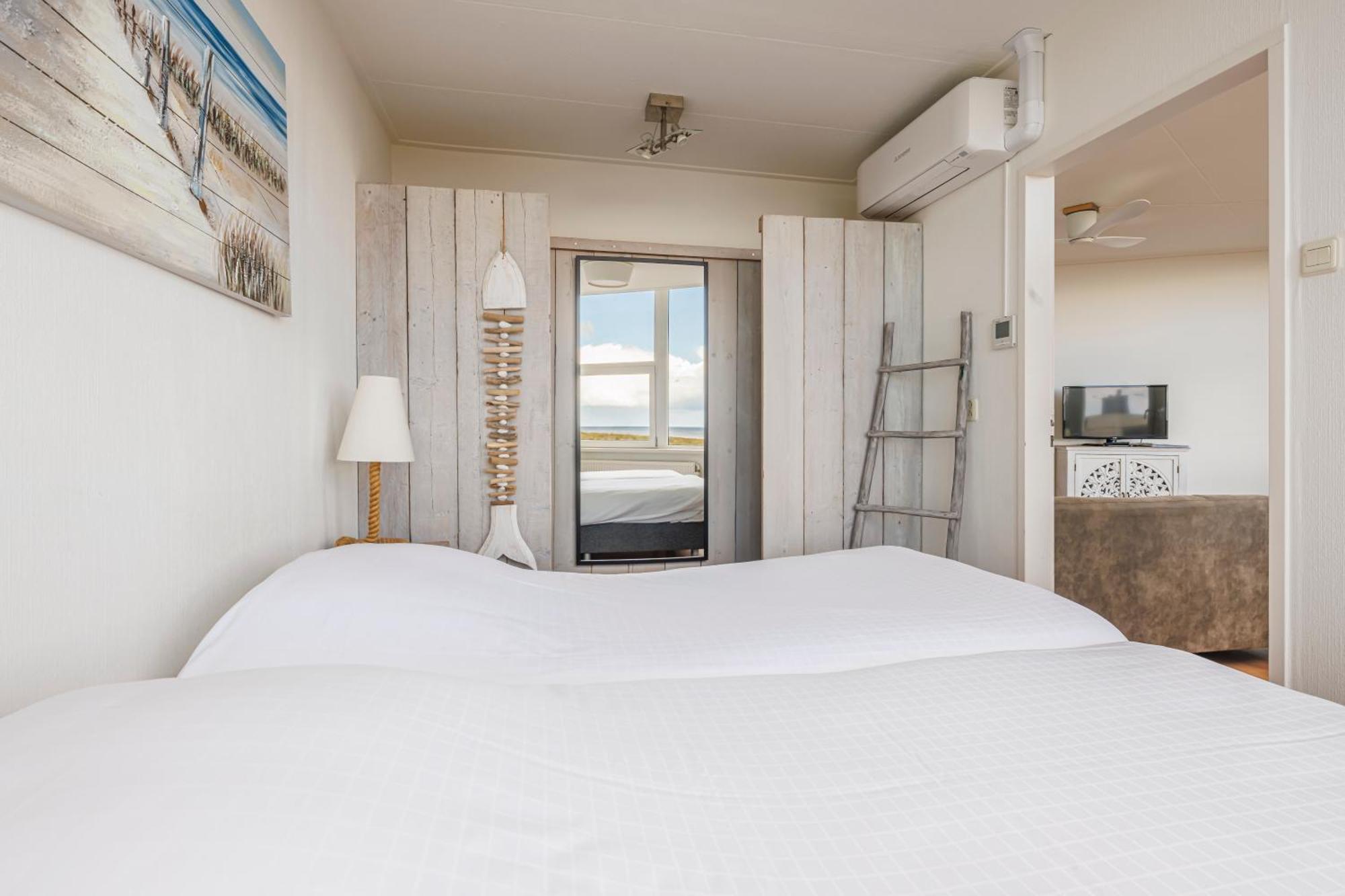 Neptunus Appartementen แบร์เกิน อาน ซี ห้อง รูปภาพ