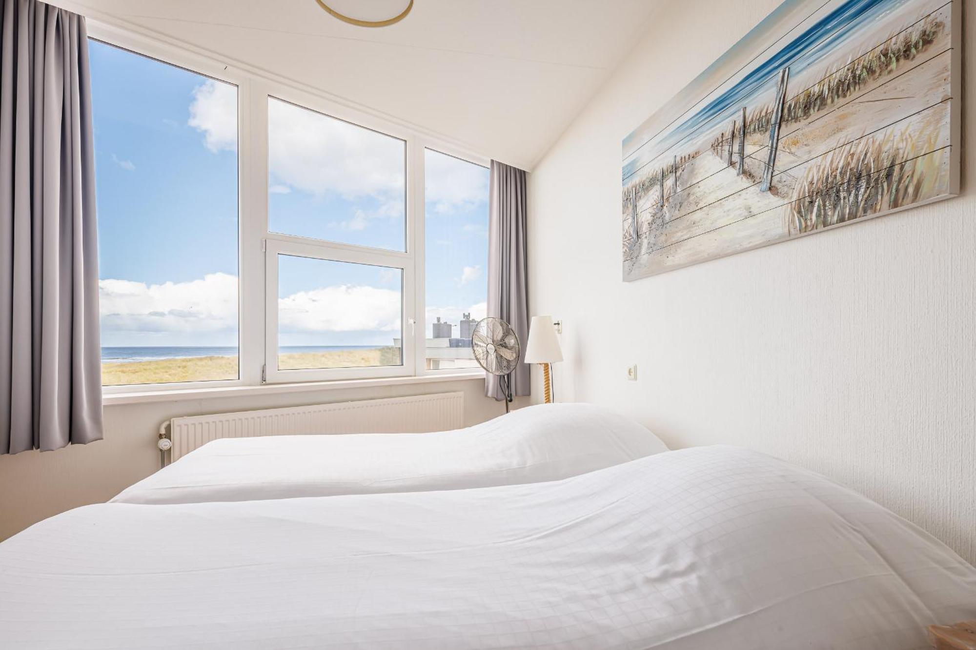 Neptunus Appartementen แบร์เกิน อาน ซี ห้อง รูปภาพ