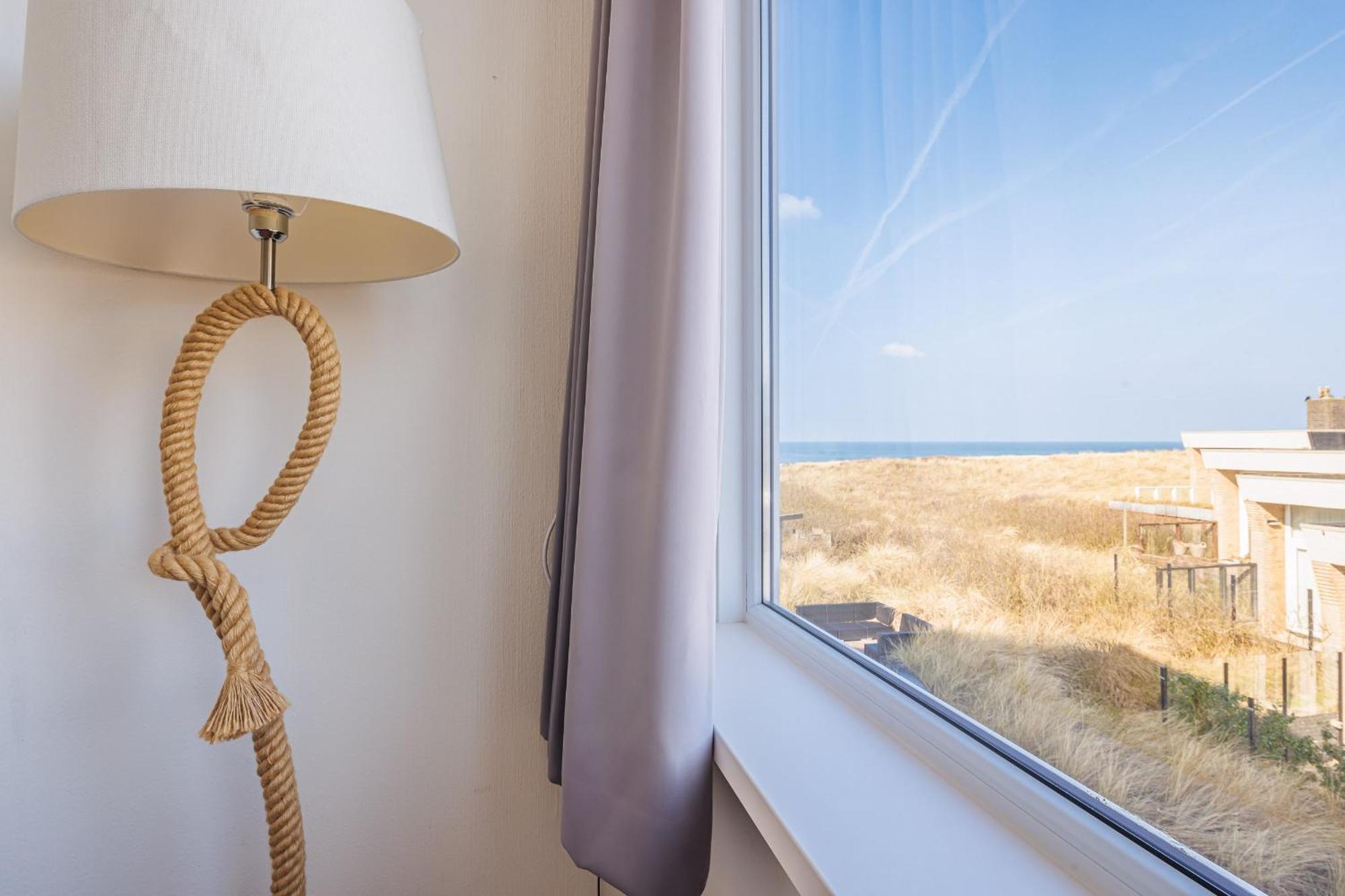 Neptunus Appartementen แบร์เกิน อาน ซี ห้อง รูปภาพ